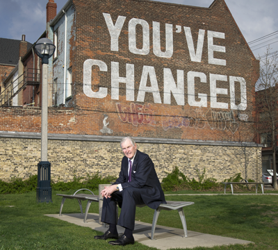 The Honourable Michael Wilson. Mural artist Jesse Harris.
