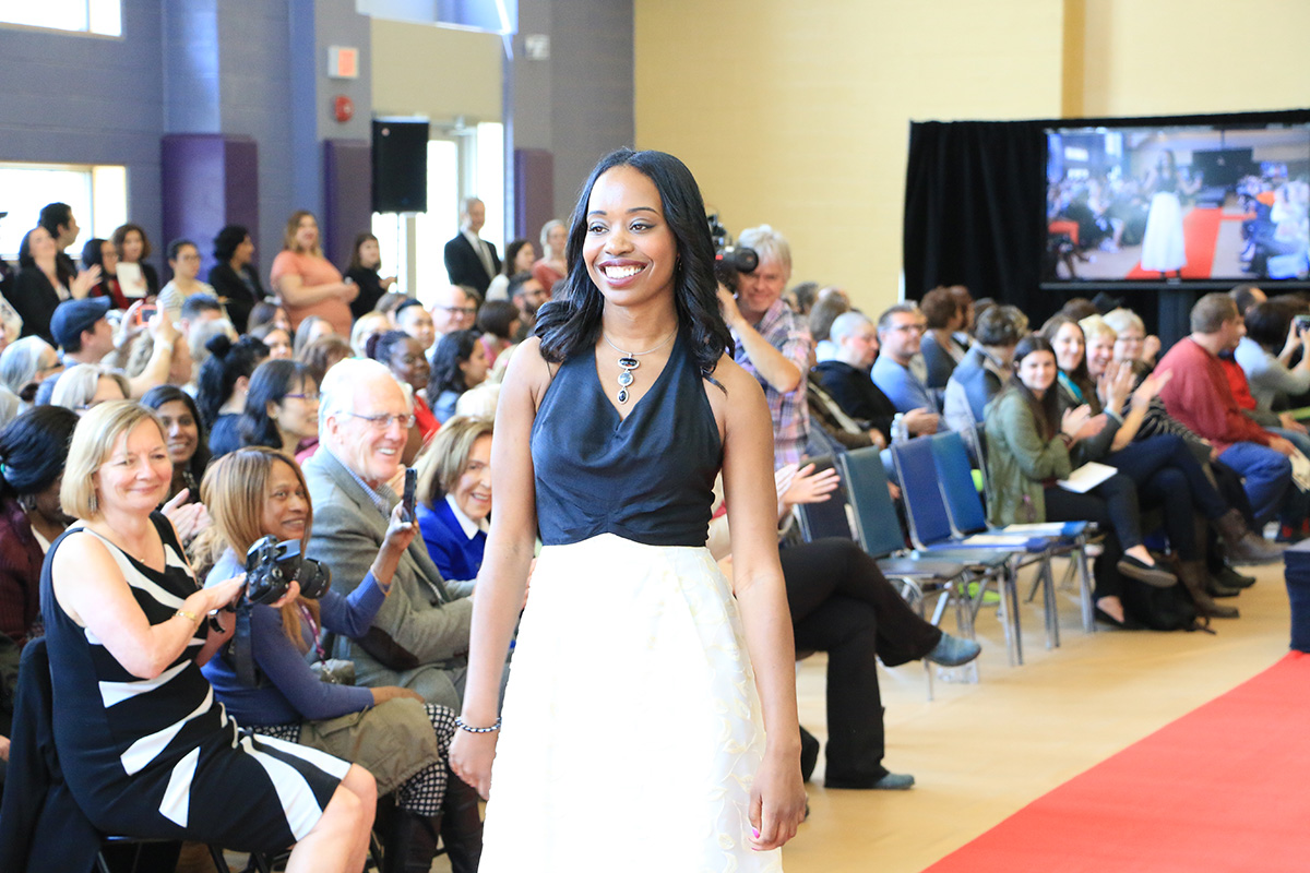 Rashida shines bright at the 12th annual Suits Me Fine Fashion Show, in which patients walk the runway in celebration of recovery
