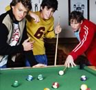 Teens playing pool 