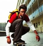 Skateboarder in apartment courtyard