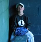 Boy baseball dugout 
