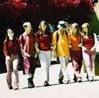 Young teens walking in group 