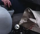 beer cans and bottles in a car