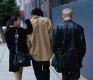 three young friends walking away