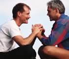 Gay couple sitting hands clasped