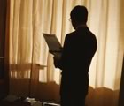 Chart reader silhouetted