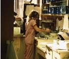 Lab worker in sunny room