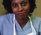Nurse with mask hanging from neck 