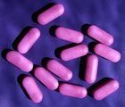Pink pills on purple