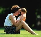 Mother and baby in park