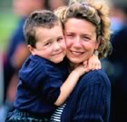 Mother holding young son