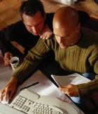 Men at computer sidebar