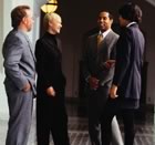 Business group chatting in hall