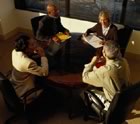 Overhead shot of four meeting
