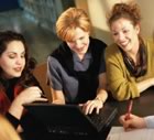 Meeting 3 happy women laptop