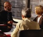 Meeting with three men in suits