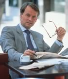 Businessman with paper and glasses