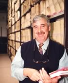 Man by library stacks