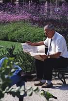 Reading park by garden