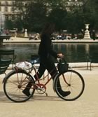 Walking bike past fountain
