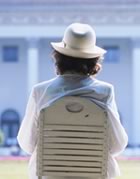 Woman sitting watching outside