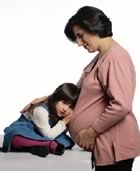 Pregnant mum with daughter