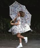 Girl in partydress fancy umbrella