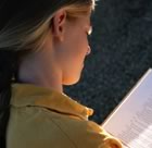Girl reading in the sun
