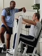 Two guys working out at gym