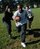 Kids playing football
