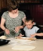 Mother and child making cookies