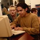 Youth pair working at computer