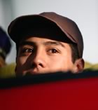 Youth watching over car door